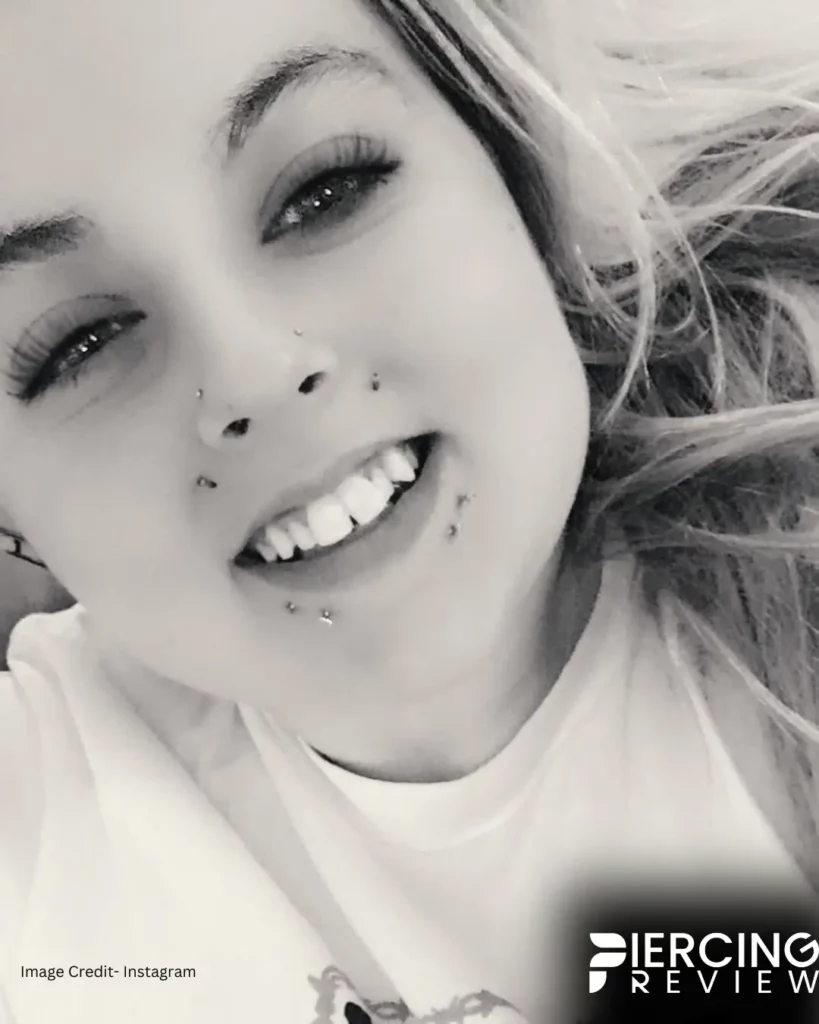 girl double puncture lower lip -Canine Bites Piercing Ideas