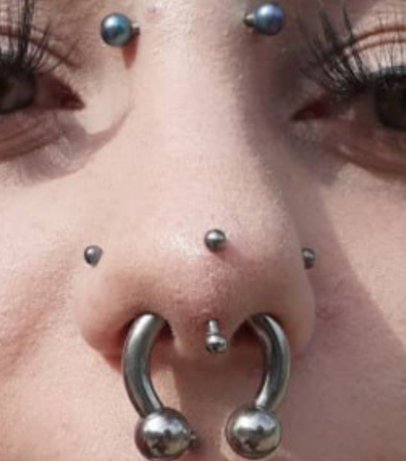 Nose Piercing Thumb